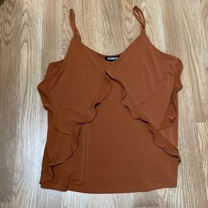 NWT. Terracota sleeveless shirt from Express 95% polyester 5%spandex.